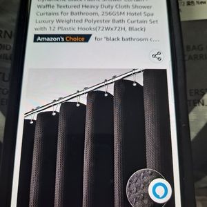 New in package black and white shower curtains with hooks.   Wsq